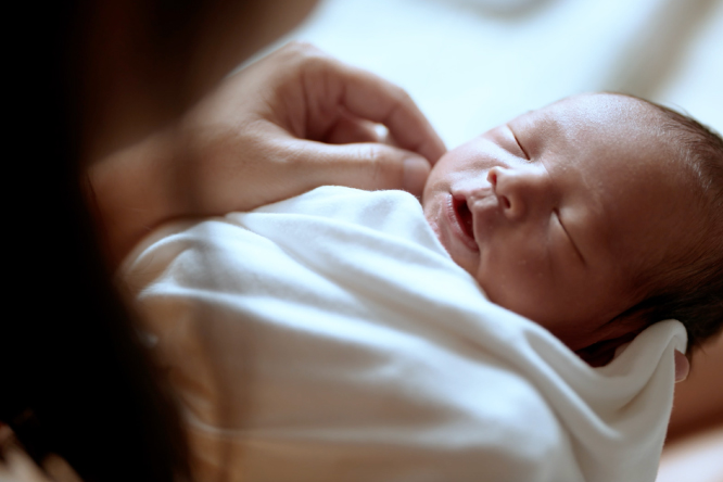 Mother holding baby