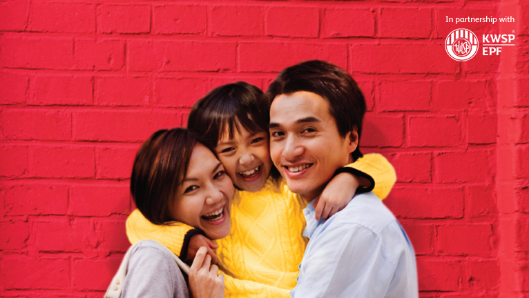Mother and father with their young daughter in a warm cuddle