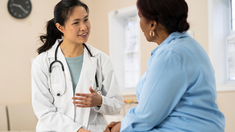 Doctor talking to patient