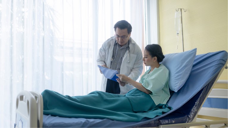 Doctor showing patient medical report