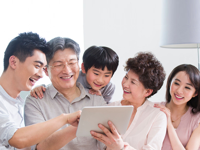 Family looking at tablet
