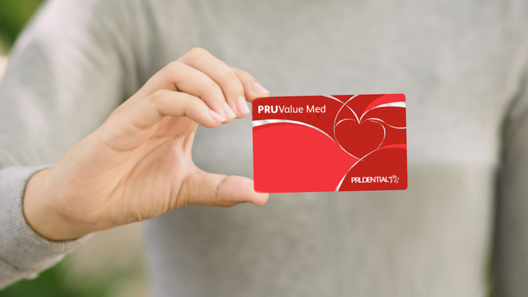 Girl holding PRUValue Med card