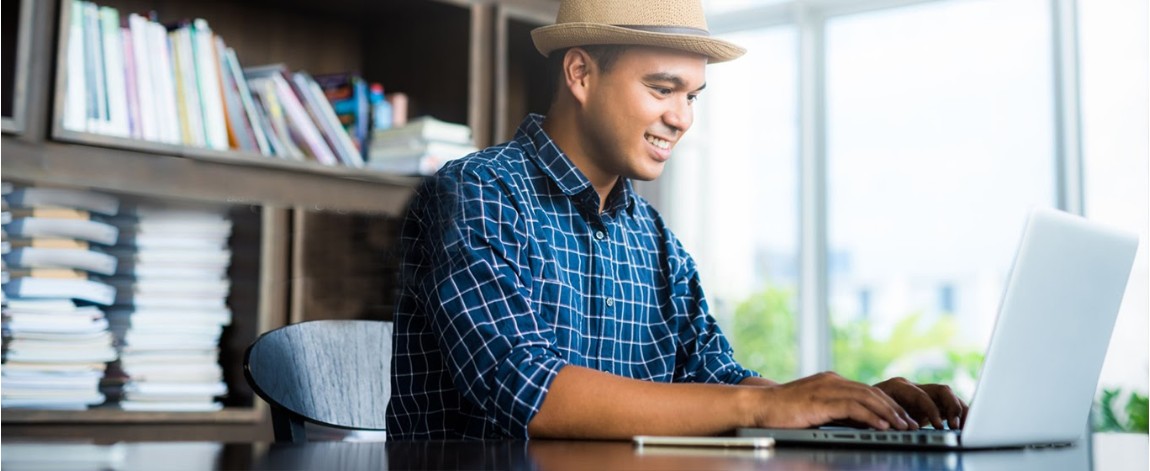 Man browsing laptop