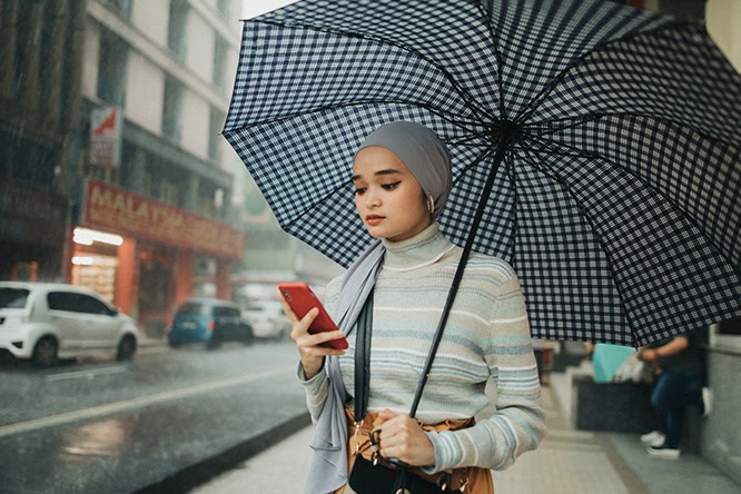 Malay girl holding an umbrella