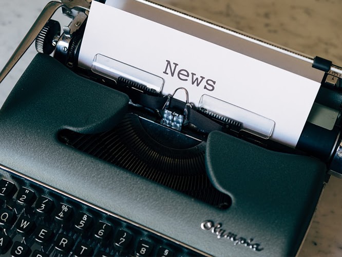 Typewriter with paper